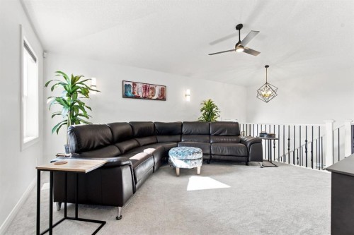 218 Boulder Creek Place, Langdon, AB - Indoor Photo Showing Living Room