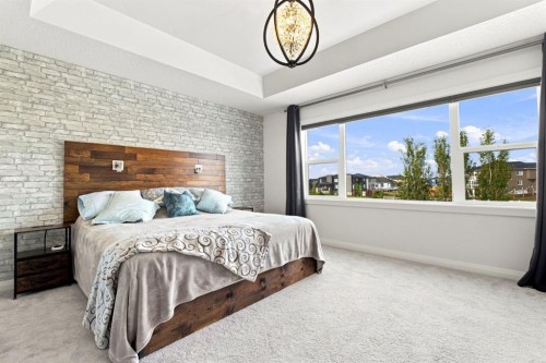 218 Boulder Creek Place, Langdon, AB - Indoor Photo Showing Bedroom