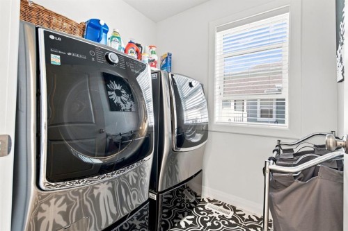 218 Boulder Creek Place, Langdon, AB - Indoor Photo Showing Laundry Room