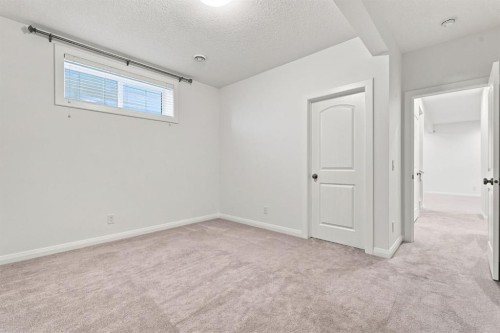 218 Boulder Creek Place, Langdon, AB - Indoor Photo Showing Other Room