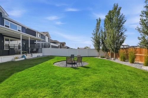 218 Boulder Creek Place, Langdon, AB - Outdoor With Backyard