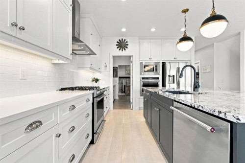218 Boulder Creek Place, Langdon, AB - Indoor Photo Showing Kitchen With Upgraded Kitchen