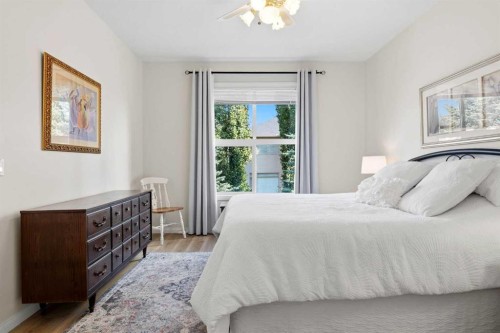 14 Evercreek Bluffs Place Sw, Calgary, AB - Indoor Photo Showing Bedroom