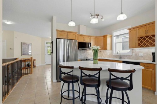 14 Evercreek Bluffs Place Sw, Calgary, AB - Indoor Photo Showing Kitchen