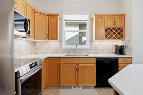 14 Evercreek Bluffs Place Sw, Calgary, AB - Indoor Photo Showing Kitchen