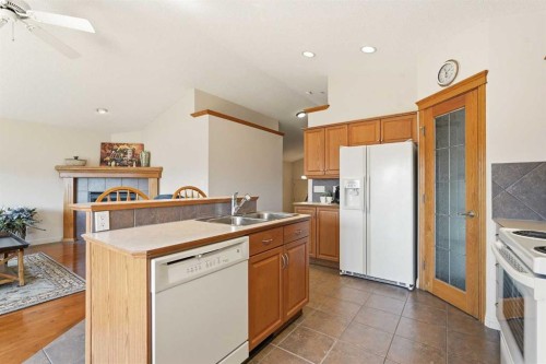 128 Covehaven Gardens Ne, Calgary, AB - Indoor Photo Showing Kitchen With Double Sink