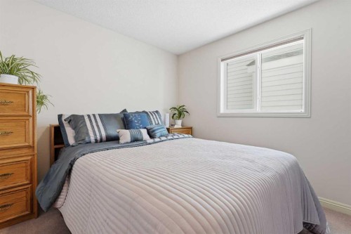 128 Covehaven Gardens Ne, Calgary, AB - Indoor Photo Showing Bedroom
