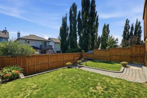 128 Covehaven Gardens Ne, Calgary, AB - Outdoor With Backyard