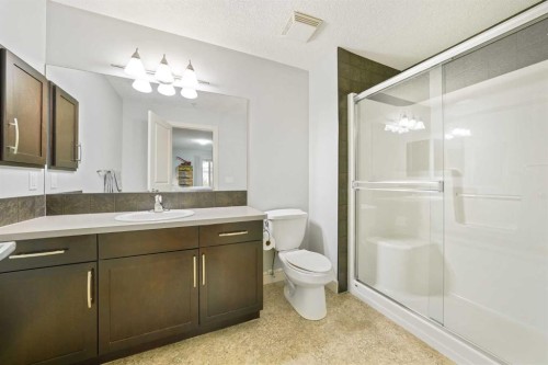 3104-15 Sunset Square, Cochrane, AB - Indoor Photo Showing Bathroom