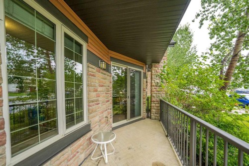 3104-15 Sunset Square, Cochrane, AB - Outdoor With Exterior