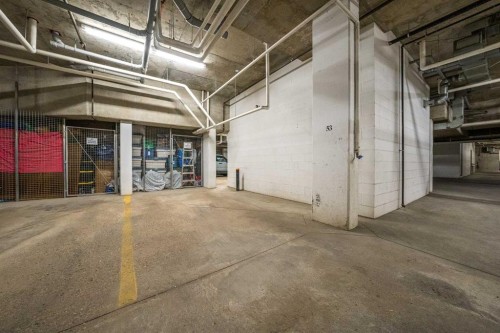 3104-15 Sunset Square, Cochrane, AB - Indoor Photo Showing Garage