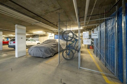 3104-15 Sunset Square, Cochrane, AB - Indoor Photo Showing Garage