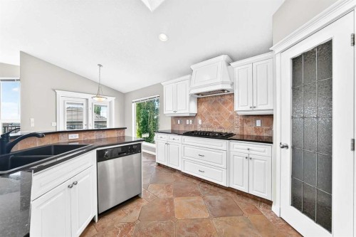 35 Arbour Vista Way Nw, Calgary, AB - Indoor Photo Showing Kitchen With Double Sink