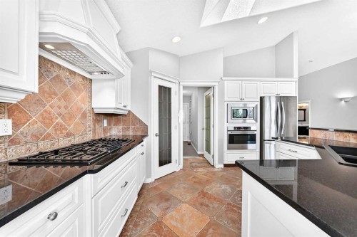 35 Arbour Vista Way Nw, Calgary, AB - Indoor Photo Showing Kitchen With Double Sink With Upgraded Kitchen