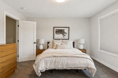 24 Willow Park Point, Cochrane, AB - Indoor Photo Showing Bedroom
