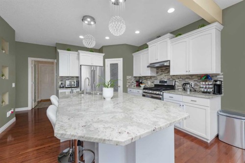 135 Kincora Drive Nw, Calgary, AB - Indoor Photo Showing Kitchen With Stainless Steel Kitchen With Double Sink With Upgraded Kitchen