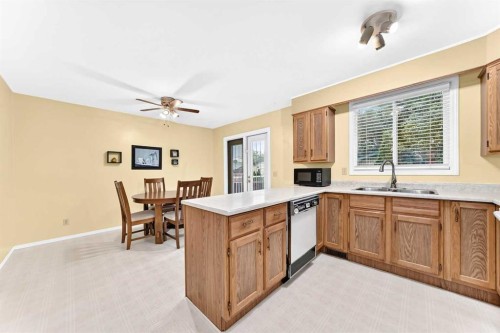 4008 46 Street Sw, Calgary, AB - Indoor Photo Showing Kitchen With Double Sink
