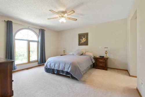 308 Canniff Place Sw, Calgary, AB - Indoor Photo Showing Bedroom