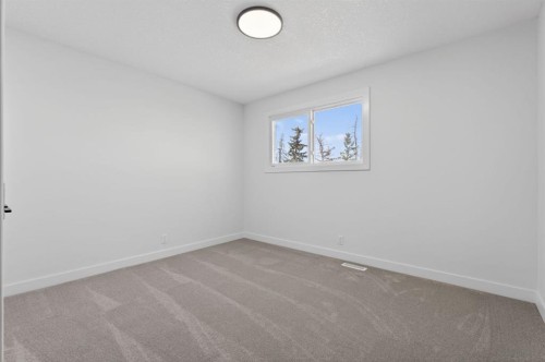 40 Bernard Way Nw, Calgary, AB - Indoor Photo Showing Other Room