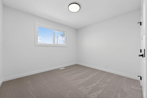 40 Bernard Way Nw, Calgary, AB - Indoor Photo Showing Other Room