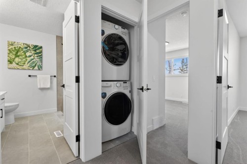 40 Bernard Way Nw, Calgary, AB - Indoor Photo Showing Laundry Room