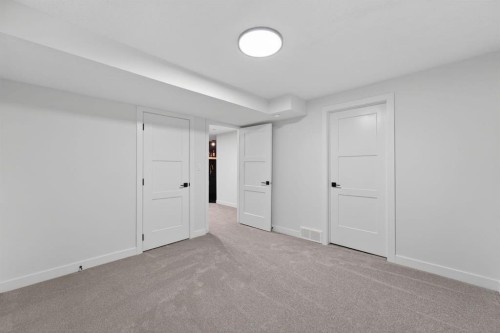 40 Bernard Way Nw, Calgary, AB - Indoor Photo Showing Other Room