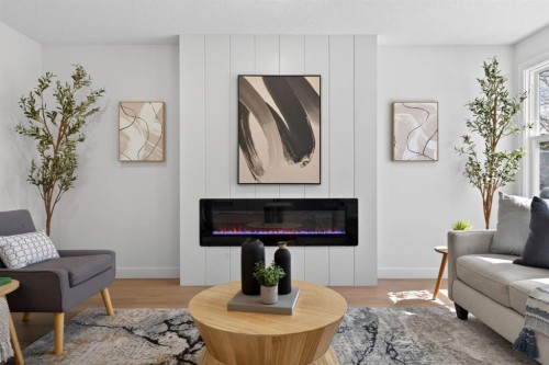 40 Bernard Way Nw, Calgary, AB - Indoor Photo Showing Living Room With Fireplace