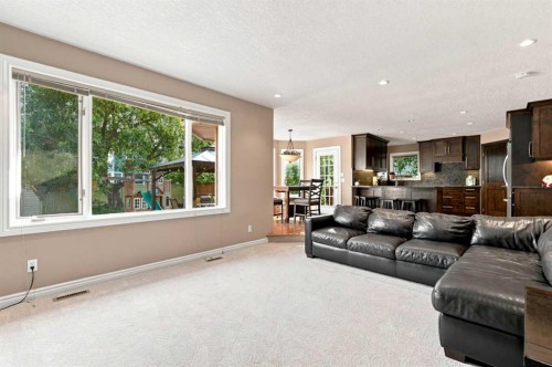70 Sunset Way Se, Calgary, AB - Indoor Photo Showing Living Room