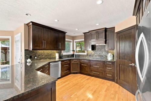 70 Sunset Way Se, Calgary, AB - Indoor Photo Showing Kitchen With Stainless Steel Kitchen With Upgraded Kitchen