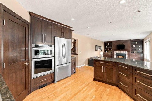 70 Sunset Way Se, Calgary, AB - Indoor Photo Showing Kitchen With Stainless Steel Kitchen