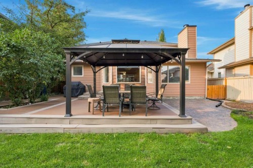 70 Sunset Way Se, Calgary, AB - Outdoor With Deck Patio Veranda
