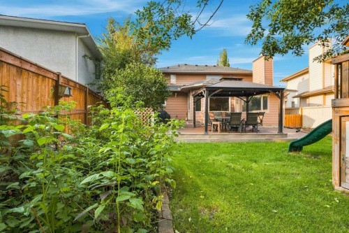 70 Sunset Way Se, Calgary, AB - Outdoor With Deck Patio Veranda