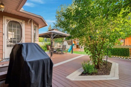 70 Sunset Way Se, Calgary, AB - Outdoor With Deck Patio Veranda