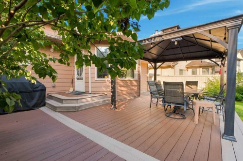 70 Sunset Way Se, Calgary, AB - Outdoor With Deck Patio Veranda With Exterior