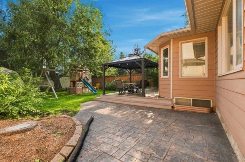 70 Sunset Way Se, Calgary, AB - Outdoor With Deck Patio Veranda