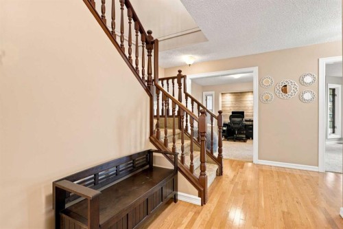 70 Sunset Way Se, Calgary, AB - Indoor Photo Showing Other Room
