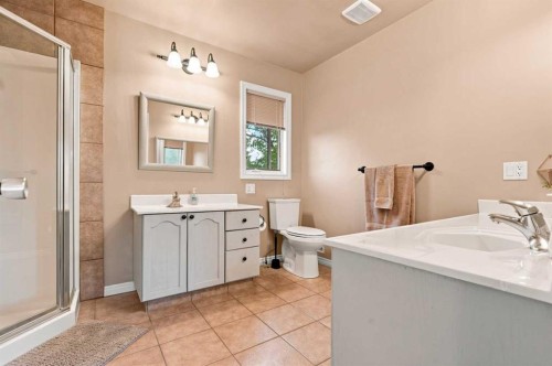 70 Sunset Way Se, Calgary, AB - Indoor Photo Showing Bathroom