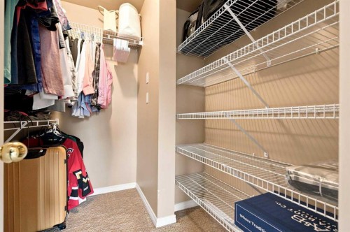 70 Sunset Way Se, Calgary, AB - Indoor With Storage