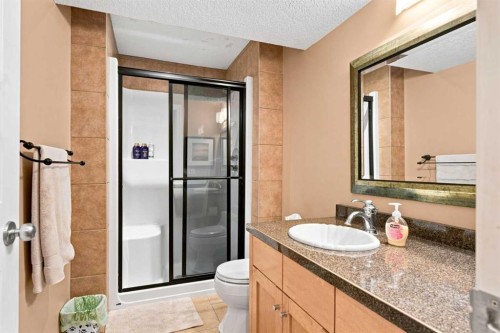 70 Sunset Way Se, Calgary, AB - Indoor Photo Showing Bathroom