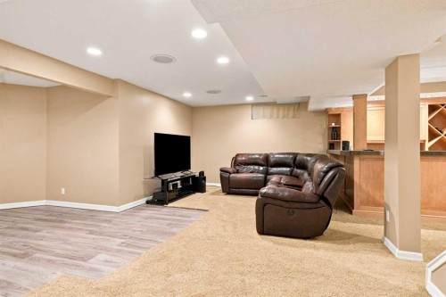 70 Sunset Way Se, Calgary, AB - Indoor Photo Showing Other Room