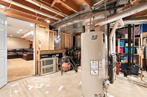 70 Sunset Way Se, Calgary, AB - Indoor Photo Showing Basement