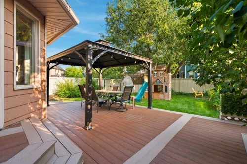 70 Sunset Way Se, Calgary, AB - Outdoor With Deck Patio Veranda With Exterior