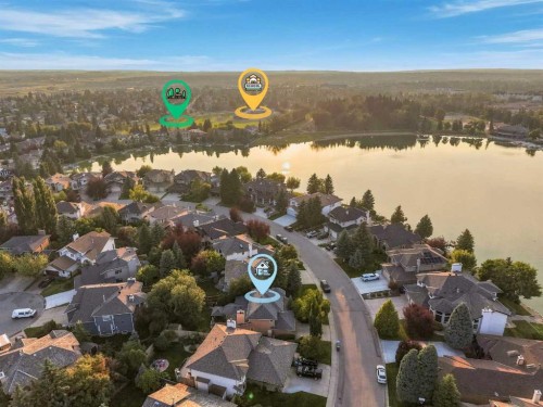 70 Sunset Way Se, Calgary, AB - Outdoor With Body Of Water With View