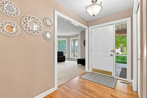 70 Sunset Way Se, Calgary, AB - Indoor Photo Showing Other Room