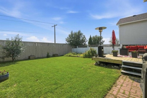 138 Somerglen Common Sw, Calgary, AB - Outdoor With Backyard