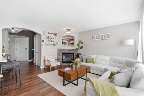 138 Somerglen Common Sw, Calgary, AB - Indoor Photo Showing Living Room With Fireplace