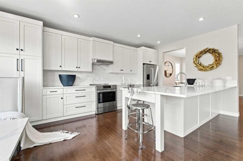 236 Hillcrest Drive Sw, Airdrie, AB - Indoor Photo Showing Kitchen With Upgraded Kitchen