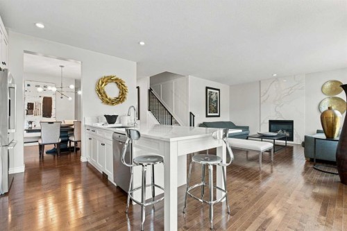 236 Hillcrest Drive Sw, Airdrie, AB - Indoor With Fireplace