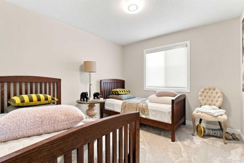 236 Hillcrest Drive Sw, Airdrie, AB - Indoor Photo Showing Bedroom