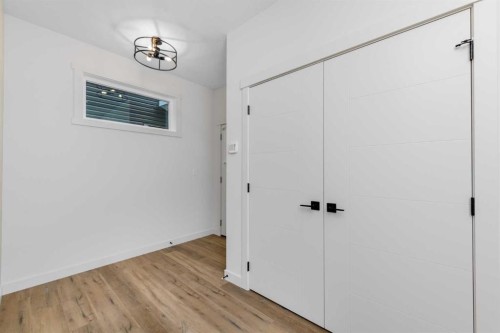 124 Heritage Boulevard, Cochrane, AB - Indoor Photo Showing Other Room